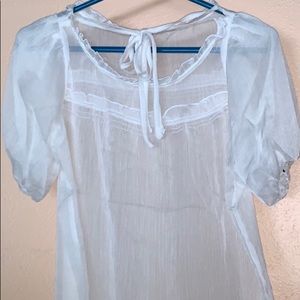 White transparent blouse with puffy sleeves